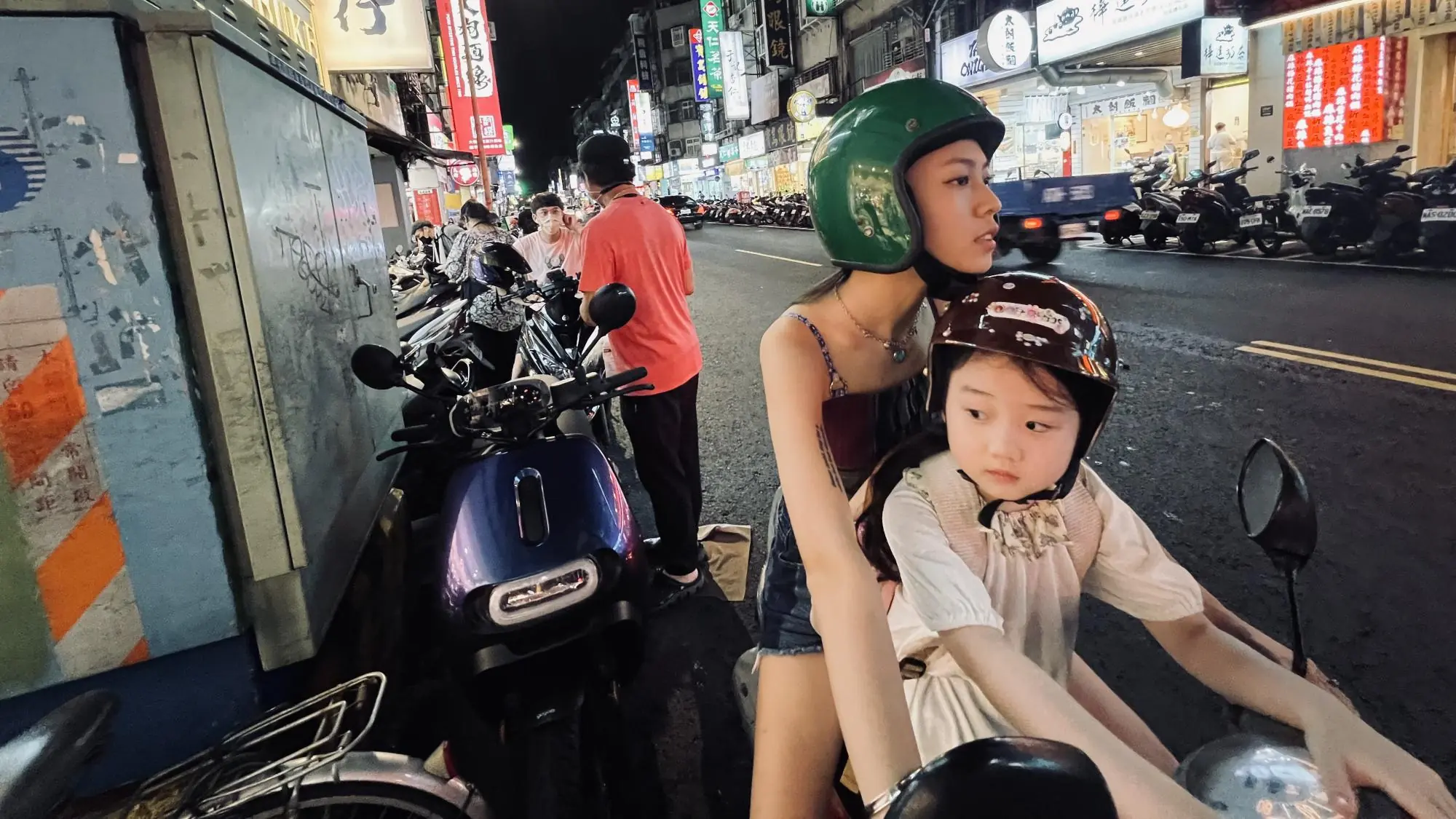 Left Handed Girl 2025 Woman And Child On Moped In Taiwan